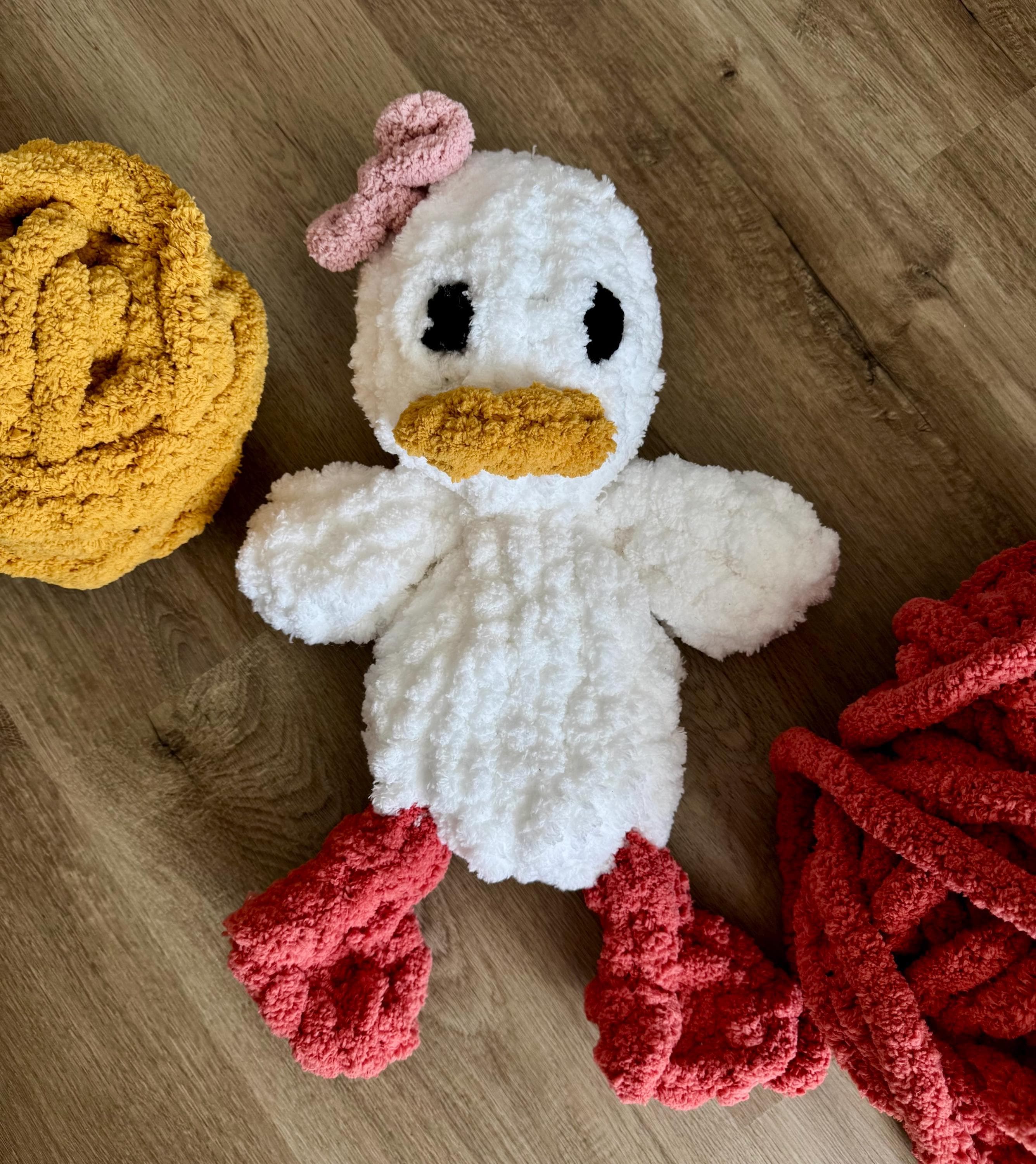 Duck Chenille Hand Knit Lovey. Handmade and Perfect for Babyshowers! Different color options and bows available. Custom orders accepted!